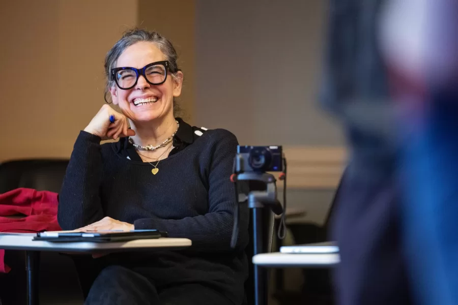 Moments from inside Laura Balladur's course FR205 in Roger WIlliams Hall captured on March 16th, 2026. Monday's are a performance day and often include theater-based games and improv.(Theophil Syslo | Bates College)

Laura Balladur is Lecturer in the French and Francophone Studies department at Bates College since 2003. Her broad interests include translation both in theory and practice, cinema, the relationship between literature and science, and the embodied mind. Her dissertation “Imagination, Physiology, and the Dynamics of Representation” (2005) explored the emergence of proto-biology in various 17th and 18th-century scientific texts in Europe. She has published on translation as well as on the history of science. Her latest article offered an alternate reading to Descartes’s dualism. True to her other undergraduate degree in Studio Arts, she keeps returning to her interest in creative projects. Currently, she is working on a creative non-fiction project describing our relationship with the Democratic Republic of the Congo, both past and present. With a generous Faculty Development Grant (April 2022), she traveled to the colonial archives in Brussels, followed by a trip to the Democratic Republic of Congo, in the North and South Kivu capitals: Goma, in the foothills of Mt Nyiragongo, and Bukavu, at the southern tip of Lake Kivu. She wanted to follow the imprints of colonial-era infrastructures onto the present-day territory. The collected voices from the many guides she met reveal the lasting wounds of colonialism with its persisting extractive economies that form the bedrock of our modern life. During the trip to the DRC, she taught a two-hour workshop on The Art of Creative Non-Fiction at the Université Catholique de Bukavu. In Fall 2022, students in her translation course met over Zoom with a few students from Bukavu who participated in that summer’s workshop. Her students’ translations along with the originals can be found here: Bridges to Bukav