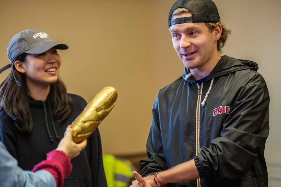 Moments from inside Laura Balladur's course FR205 in Roger WIlliams Hall captured on March 16th, 2026. Monday's are a performance day and often include theater-based games and improv.(Theophil Syslo | Bates College)

Laura Balladur is Lecturer in the French and Francophone Studies department at Bates College since 2003. Her broad interests include translation both in theory and practice, cinema, the relationship between literature and science, and the embodied mind. Her dissertation “Imagination, Physiology, and the Dynamics of Representation” (2005) explored the emergence of proto-biology in various 17th and 18th-century scientific texts in Europe. She has published on translation as well as on the history of science. Her latest article offered an alternate reading to Descartes’s dualism. True to her other undergraduate degree in Studio Arts, she keeps returning to her interest in creative projects. Currently, she is working on a creative non-fiction project describing our relationship with the Democratic Republic of the Congo, both past and present. With a generous Faculty Development Grant (April 2022), she traveled to the colonial archives in Brussels, followed by a trip to the Democratic Republic of Congo, in the North and South Kivu capitals: Goma, in the foothills of Mt Nyiragongo, and Bukavu, at the southern tip of Lake Kivu. She wanted to follow the imprints of colonial-era infrastructures onto the present-day territory. The collected voices from the many guides she met reveal the lasting wounds of colonialism with its persisting extractive economies that form the bedrock of our modern life. During the trip to the DRC, she taught a two-hour workshop on The Art of Creative Non-Fiction at the Université Catholique de Bukavu. In Fall 2022, students in her translation course met over Zoom with a few students from Bukavu who participated in that summer’s workshop. Her students’ translations along with the originals can be found here: Bridges to Bukav