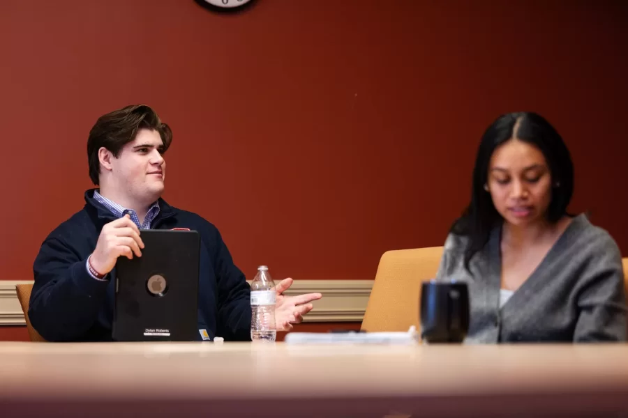 Two students engage in a class discussion during a Race and Tobacco class in Roger Williams Hall.