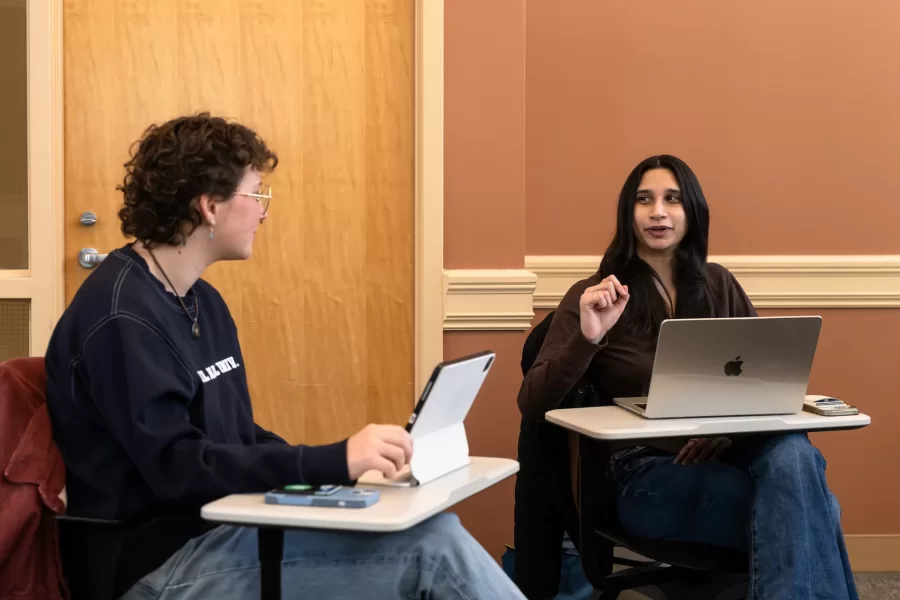 Two students have a discussion during an Asian Studies Samurai class in Hedge Hall.