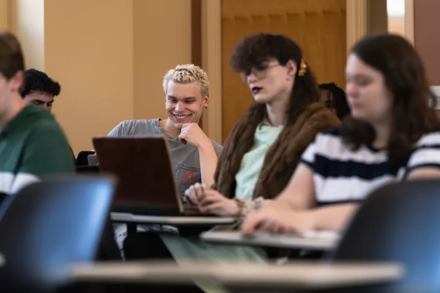 A student reacts to a discussion during an Asian Studies Samurai class in Hedge Hall.