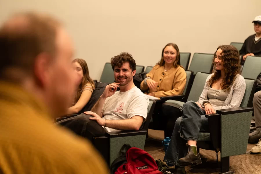 Lewiston, ME, United States  -- Students discuss whether they should show the film, “Say Cheese!” by Bates alum Amy Geller `96, during a Film Festival Studies taught by Professor Jonathan J. Cavallero in Olin Arts Center 105 at Bates College in Lewiston, ME on Wednesday, March 25, 2026. Students discussed whether they should show the film at the upcoming festival and whether the festival should help fund an original score for the film due to copyright issues with the music currently being used in it. (Photo by Yoon S. Byun) © 2026 Strewn Wonder, LLC