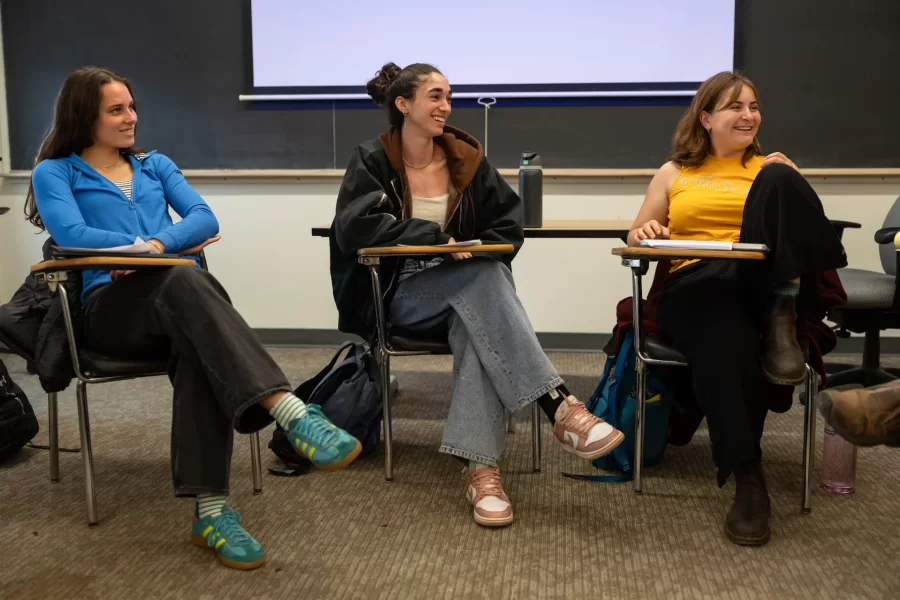Students react to an essay during a Reimagining Africana class in Pettigrew Hall.