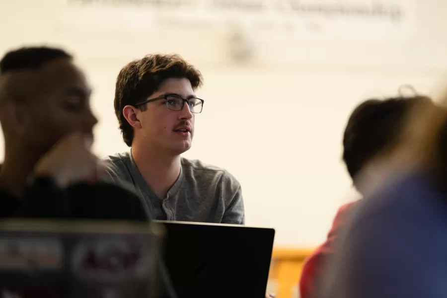 Student shares perspective on the movie "Moonlight" in class discussion during a Reimagining Africana class in Pettigrew Hall.