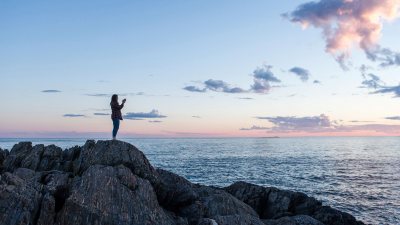 Cailene Gunn '16 of Granby, CT (Summer Research with Prof. Beverly Johnson) does some sunset-inspired Yoga on Hermit Island in Phippsburg, ME.