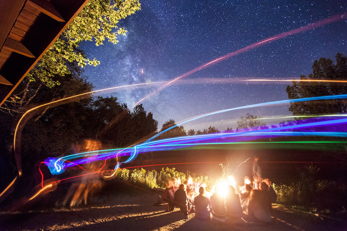 AESOP trips Mt. Blue 1 and Mt. Blue 2 enjoy a game of light up frisbee over the campfire and under the stars