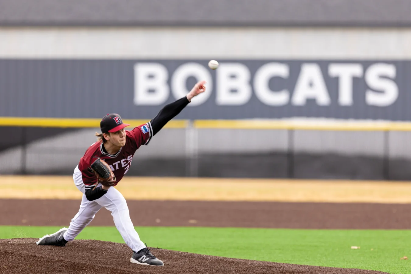 A Bates baseball player pitching a ball.
