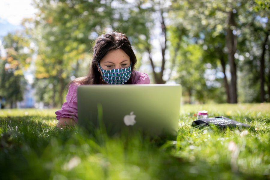 Enjoying the last day of August 2020 on campus during Orientation Week: Augu. 30, 2020.
Anna Greenspan '22 of Westport, Conn., working on her resume in connection with Purposeful Work. She was hanging out with Charlotte Collins '22 of Woolwich, Maine, as they waited for a friend to take a walk.