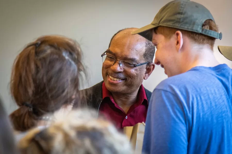 Faculty, Alumni, Staff and Students celebrate Dean Reese's birthday party in Bonney Science Center during Back to Bates Weekend 2025.