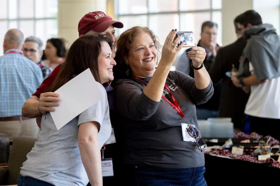 Back to Bates Weekend at a variety of locations on campus, including Pettengill Hall, where Bates alumni were honored with an awards presentation and a dessert reception, the registration desk in the Library Well, and the Bardwell Street Tent, where seniors over 21 and alumni enjoyed a beer garden and food.

Bates defeated Bowdoin 21-14 at the Alumni Big Game Saturday, today, Oct. 15, 2022, and the Garcelon Field crowd went wild.