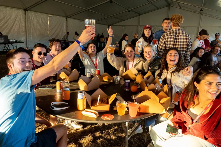 Back to Bates Weekend at a variety of locations on campus, including Pettengill Hall, where Bates alumni were honored with an awards presentation and a dessert reception, the registration desk in the Library Well, and the Bardwell Street Tent, where seniors over 21 and alumni enjoyed a beer garden and food.

Bates defeated Bowdoin 21-14 at the Alumni Big Game Saturday, today, Oct. 15, 2022, and the Garcelon Field crowd went wild.