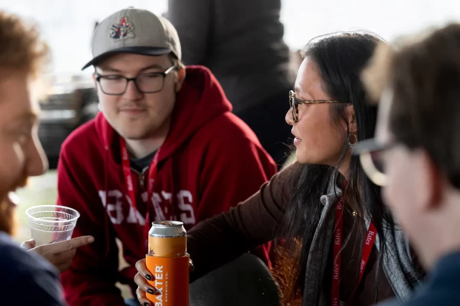 Back to Bates Weekend at a variety of locations on campus, including Pettengill Hall, where Bates alumni were honored with an awards presentation and a dessert reception, the registration desk in the Library Well, and the Bardwell Street Tent, where seniors over 21 and alumni enjoyed a beer garden and food.

Bates defeated Bowdoin 21-14 at the Alumni Big Game Saturday, today, Oct. 15, 2022, and the Garcelon Field crowd went wild.