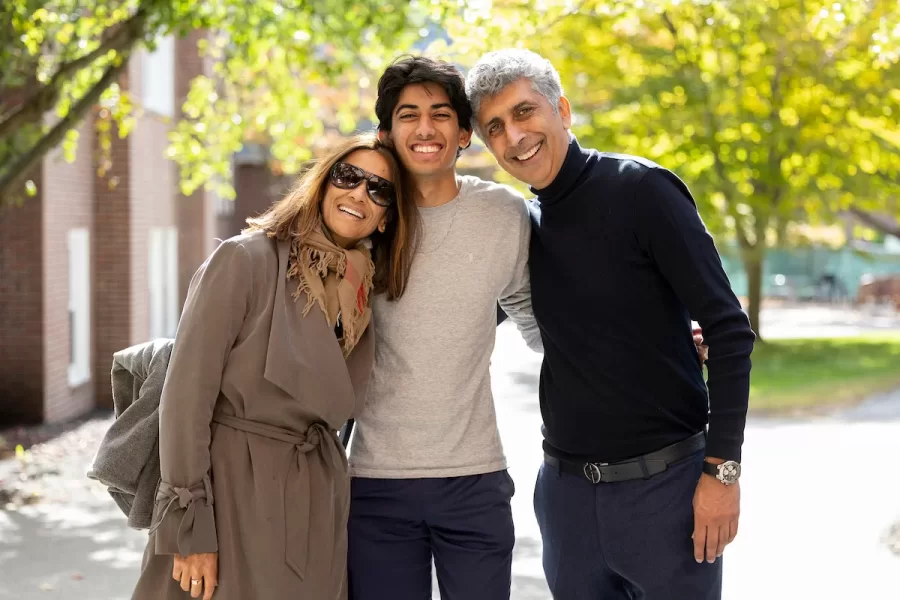 Back to Bates Weekend on Friday, Sept. 30, 2022.
Jay Gulati ’26 of Minneapolis is joined by his parents Ani and Juhi Gulati as they sign in for the weekend at the Library Arcade.