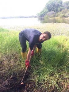 Mackenzie digging the grass up