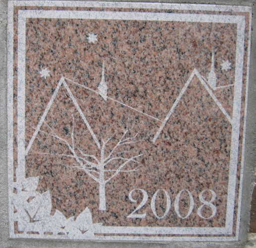 The 2008 ivy stone is on the Alumni Walk side of Pettengill