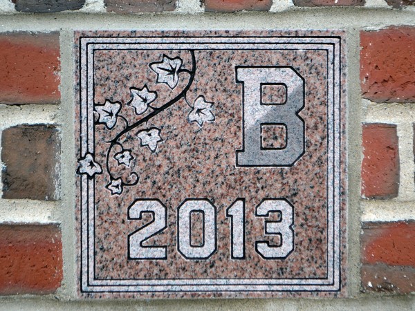 The 2013 ivy stone is on the Alumni Walk side of Pettengill