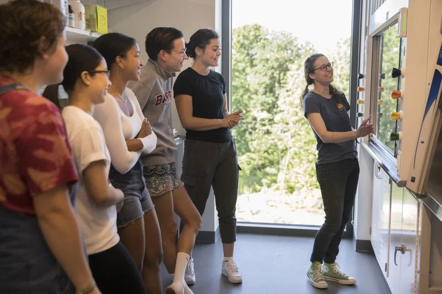 Students looking at the glass in the lab.

Summer research students, working under the supervision of  Assistant Professor of Chemistry and Biochemistry Colleen O’Loughlin, admire the well-organized symmetry of her lab glass that they’ll use this summer. From left, Diana Rodriguez ‘24, Julie Jesurum ‘22, Joanna Atwater ‘23, and Nick Gajarski ‘24.

Other photos include them looking at her office and at work in her lab. They also stop to chat with Professor Paula Schlax. _____________________

Other two students are
Anna Gouveia '22 of Jenkintown, Pa.
Sam Colesworthy '22 of North Yarmouth, Maine