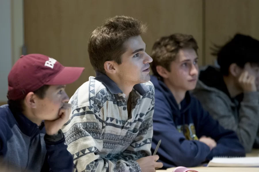 Associate Professor of Classical and Medieval Studies Lisa Maurizio teaches CMRE 218 - Greek and Roman Myths during Back to Bates Weekend as a few parents sit in on the class.