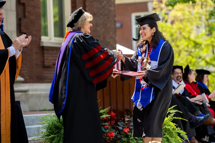 Spencer congratulates Martha Reyes '23, a mathematics major from Los Angeles, during her final Commencement on May 28, 2023.