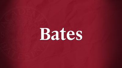 White Bates wordmark over garnet background