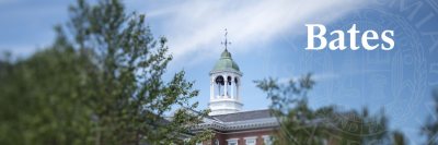 Hathorn Hall with blue sky surrounded by greenery with white Bates wordmark