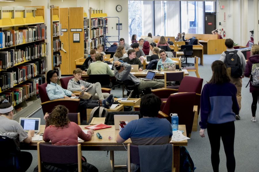 Students pack the Ladd Library during the week before finals in April 2018. Students have sometimes pushed the library and their professors to explore alternatives to traditional textbooks.  (Phyllis Graber Jensen/Bates College)