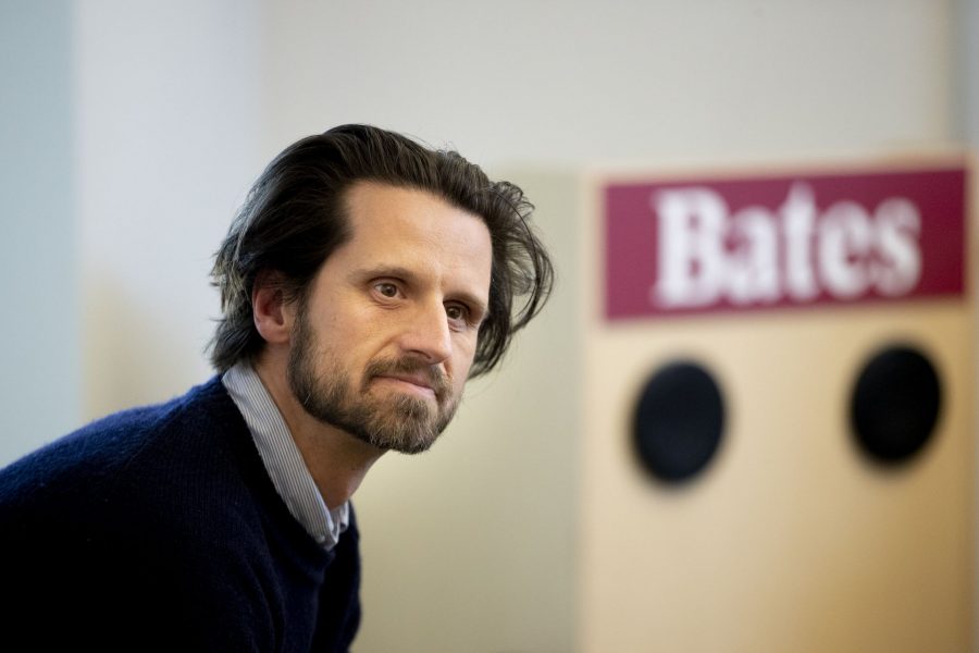 Bates sustainability manager Tom Twist is shown during the May 2019 Committee on Environmental Responsibility meeting at which it was announced that the college had attained carbon neutrality. (Phyllis Graber Jensen/Bates College)