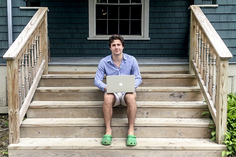 Avi Brach Neufeld '20 of Silver Spring, Md., poses on the porch of his off-campus Lewiston home with and without his laptop.
t soon became clear that three seniors in the course — Leo Crossman, Fahim Khan, and Avi Brach-Neufeld — already had considerable know-how in the snake-named programming language. (Also involved in the project are two EcoReps, Biruk Chafamo ’22 of Addis Ababa, Ethiopia, and Kyung Phil Ko ’22 of Ontario.)