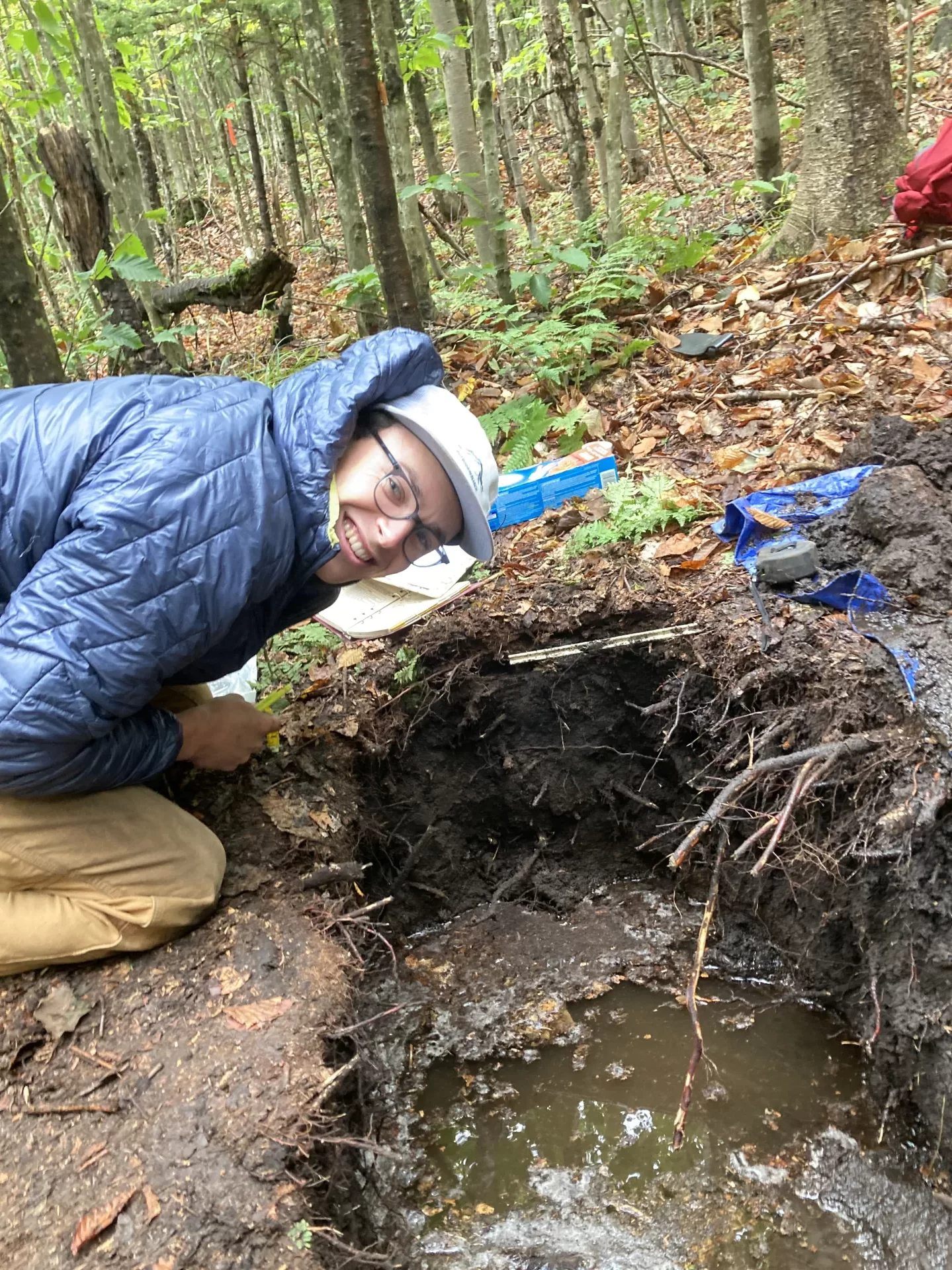 Eli Gundersen (Geology 2023) studying the soil-groundwater interface at Hubbard Brook Experimental Forest, in NH.