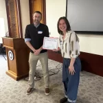 Sam Turtle, honors thesis student receiving Best Poster Award at the Geological Society of Maine (GSM) 2025 meeting at Colby college