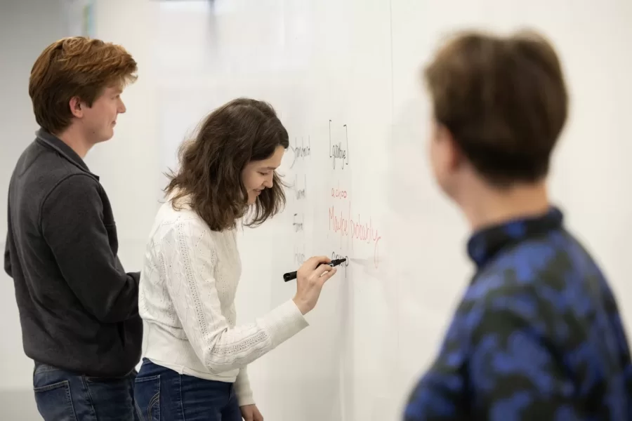 Aleisha Martinez Sandoval ’26 of of Edinburg, Texas, (left) and Caroline Cassell ’24 of Woodstock, Vt., listen in rapt attention to Otis speaker Nancy Campbell in a Dana Hall classroom as Campbell explains a writing exercise.

Campbell met with Director of Student Writing and Lecturer in Humanities Bridget Fullerton and the peer-writing tutors at 4:15 in Dana 204.