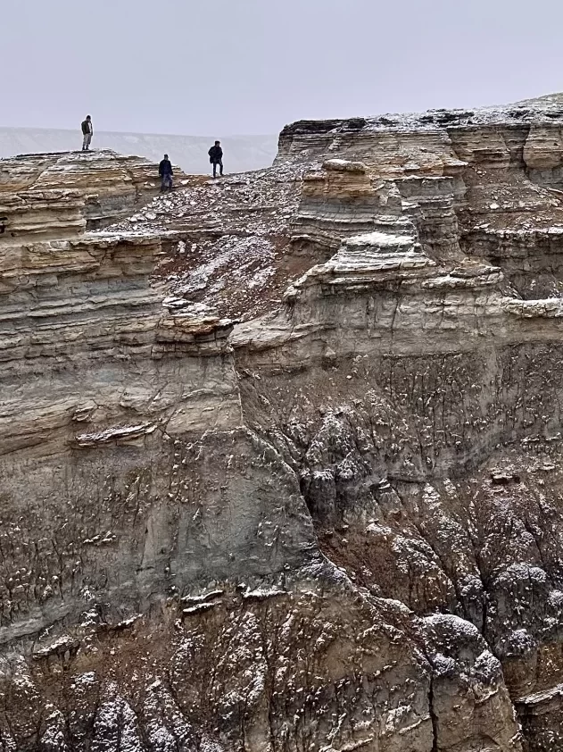 My friends and Malik from a distance, a few hours away from Aktau, which borders the Caspian Sea in western Kazakhstan. We spent two days off-road touring the fantastic natural and historic landmarks on what has to have been the coolest trip of my life. (Photo: Olivia Smith)