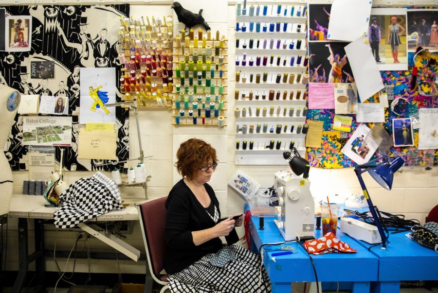 Associate Professor of Theater Christine McDowell leads a team of Bates students who are living in the Village in the Costume Shop in an effort to make coronavirus masks for members of the Bates community in the theater department's costume shop. Her mother, a quilter, has donated much of the fabric for the masks.