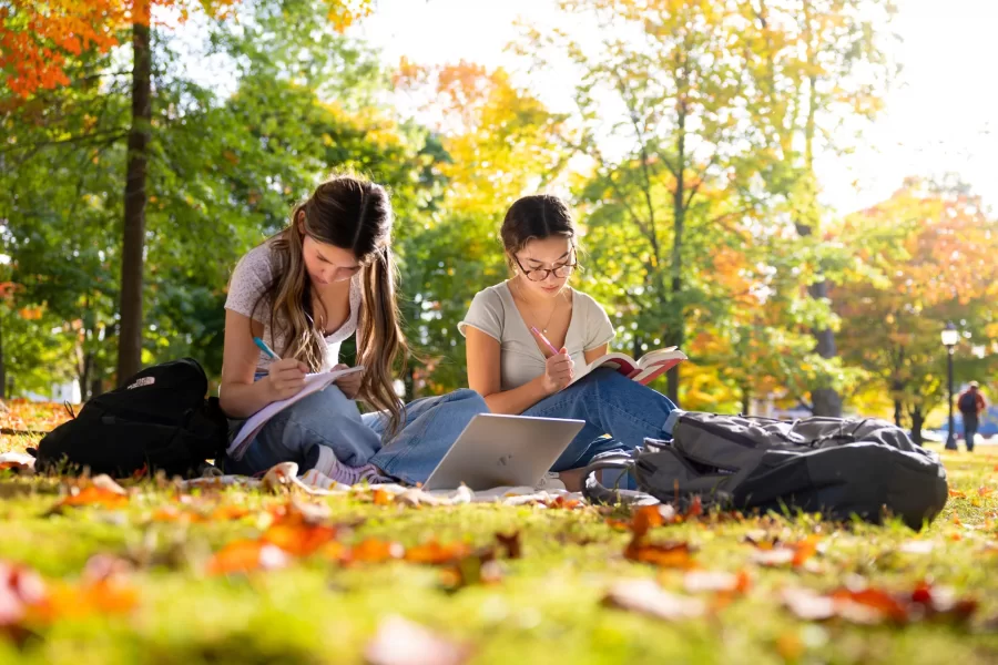 Not long before Fall Recess began, (from left) Lucy Green '26 of Upland, Calif., and Carly Freund '26 of Newfields, N.H., found a beautiful place to study on the Historic Quad. The Bates Fund provides critical support for students experiencing Bates at this very moment. Gifts to the Bates Fund impact every aspect of life at Bates, including financial aid, student-faculty research, and campus programming.