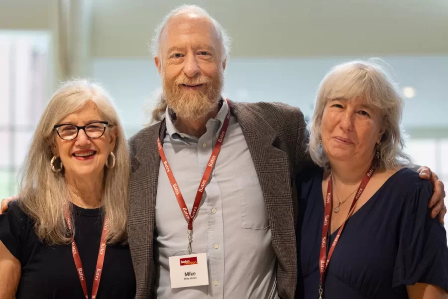 President Garry W. Jenkins addresses members of the Class of 1975 at their 50th Reunion Breakfast in Pettengill Hall’s Perry Atrium on June 6, 2025. He presented to awards: one, Bates Best,  to Susan Bourgault Akie ’75 P’08, and the other. The 2025 50th Reunion Philanthropic Leadership Award, posthumously, to John R. Hester ’75 whose brother Andy Hester (in green), nephew and Andy’s son Geoffrey Hester, John’s brother Mike Hester (in brown) with John’s wife Bronwen, accepted the honor.