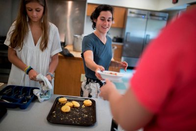 Students work on food insecurity and tobacco use at Blake Street Towers. (Photo: Kristen Cloutier)