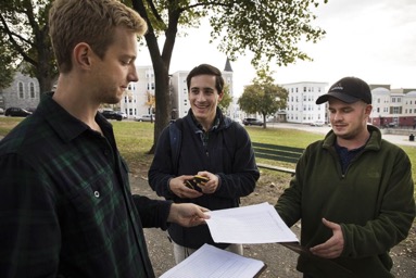 Noah Morasch, Dacota Griffin and Joe Tulip catalog the natural amenities in and around Lewiston’s Kennedy Park in November 2017. The research was used to inform the city’s Choice Neighborhood transformation plan. Theophil Syslo/Bates College