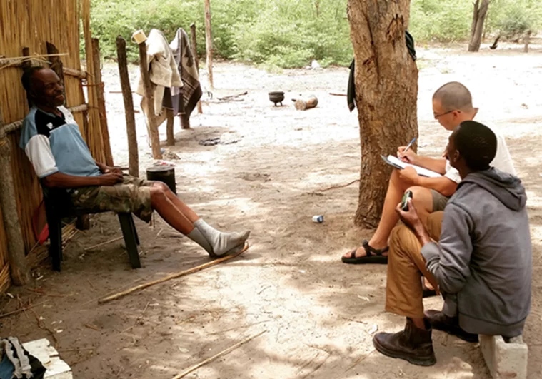 LeFlore and Research Assistant Mathata Tomeletso interviewing a local stakeholder in a village of the Okavango Delta, Botswana