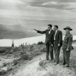 Maine Senator Edmund S. Muskie, left, with Secretary of the Interior Stewart Udall and an unidentified National Park Service employee at Cadillac Mountain in Acadia National Park.
