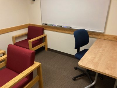 Study Room with three lounge chairs, desk, office chair, tv, DVD/Bluray and VHS