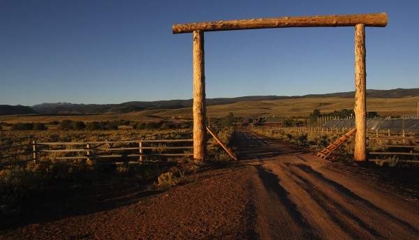 Sun rises over the Laramie River Dude Ranch of Bill Burleigh '86 and family. Photograph by Shauna Stephenson.