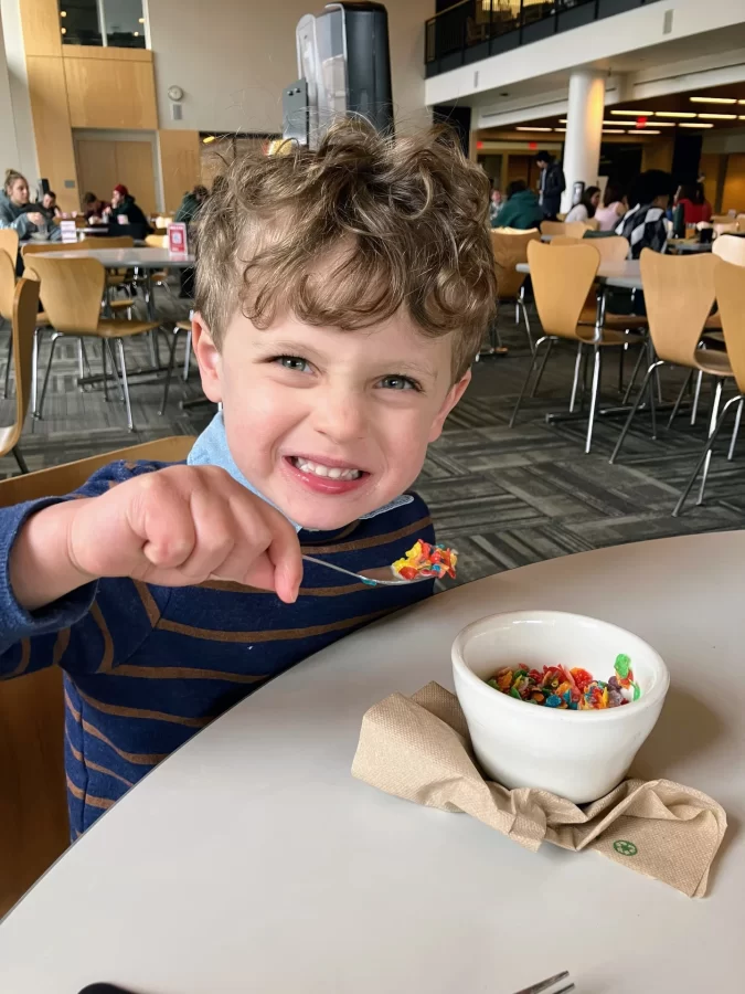 Anders Enman eats cereal at the Bates College Commons