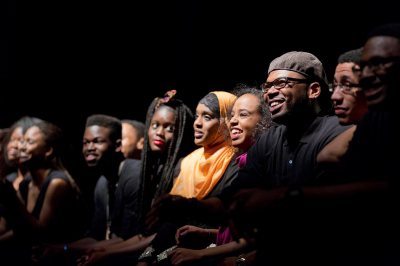 Bates student performers in the organization Sankofa answer questions from the audience following their performance during the evening of Martin Luther King Jr. Day 2014. (Phyllis Graber Jensen/Bates College)