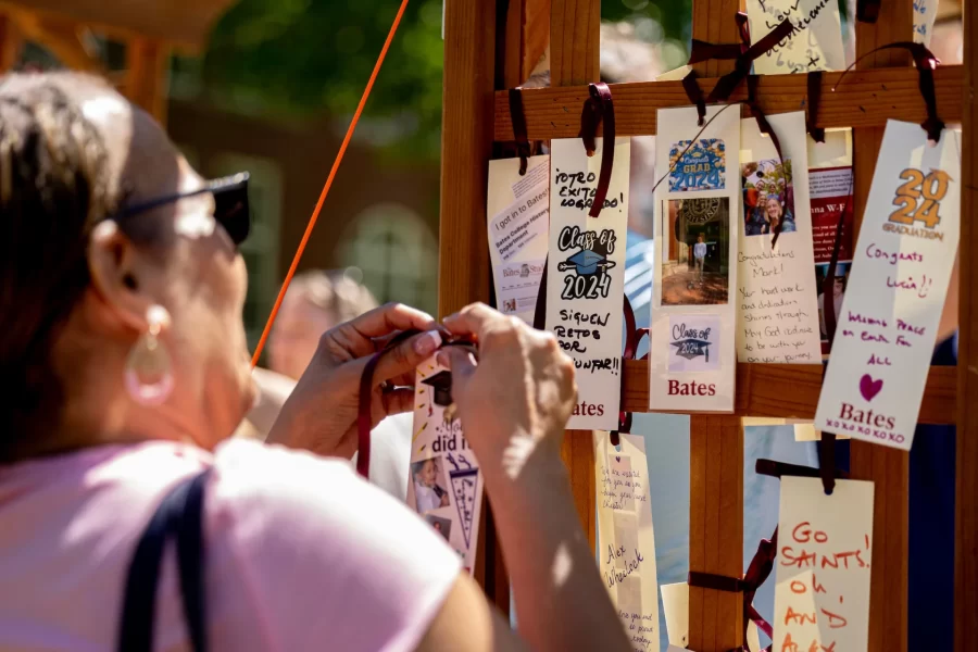 Hanging a blessing tag on an arch