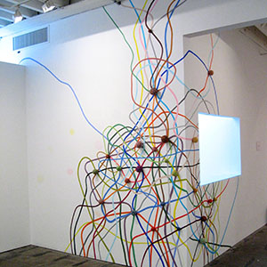Eric HongistoUntitled (Theory of Tumbleweeds), 2004acrylic and yarn balls132 x 200 x 3 inches