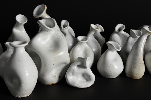 Celia Feal-Staub, Gut Feeling (detail), 2019, reduction fired stoneware, sizes range from 4 x 3 x 4 to 4 x 4 x 12 inches