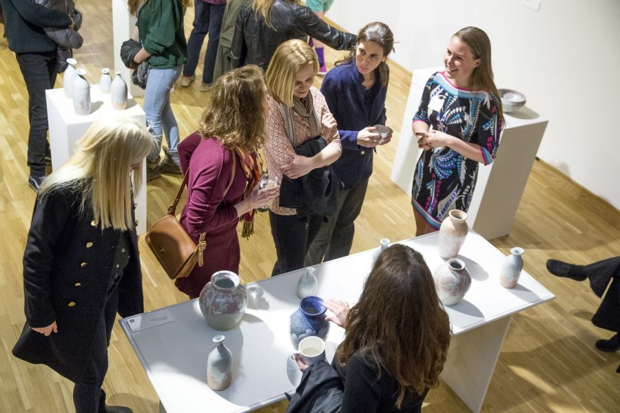 The 2016 Senior Thesis Exhibition and reception at the Bates College Museum of Art is filled with beautiful work and excited visitors The artists will be there to greet you!
"Someone came in here and looked at our stuff and said 'you guys are really vibing off of each other.'"
-- Sasha Lennon '16 of Cape Elizabeth, a double major in studio art and psychology (left) and Natalie Silver '16 of Bennington, Vt., a double major in studio art and history, throw pots for the Annual Senior Exhibition in their ground-floor Olin Arts studio. As co-coordinators of the Annual Entering Student Outdoor Program (along with classmate Jordan Cargill), they are close friends who share not only a studio but also an interest in the balance of form and function in their ceramic art. (Phyllis Graber Jensen/ Bates College)
