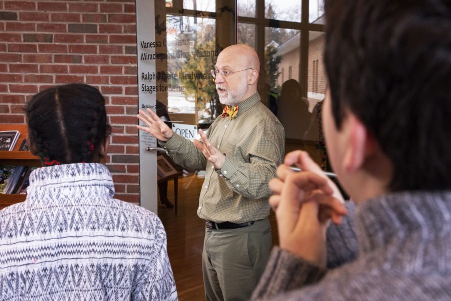 Anthony Shostak, education curator at the Bates Museum of Art, greets Lewiston middle Schoolers as they arrive on campus on February 5, 2020.