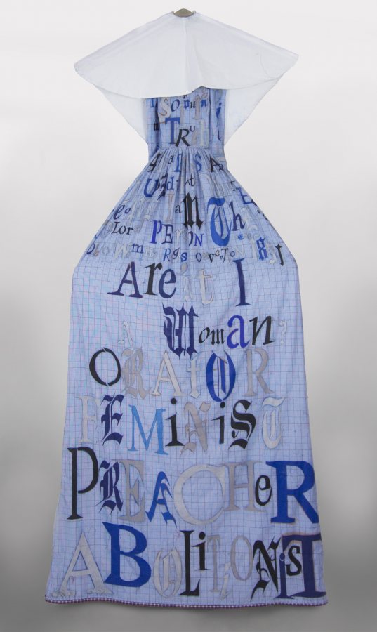 Lesley Dill, Revelator (Sojourner Truth), 2017, oil paint, thread on fabric, wooden yoke and shoe lasts, 103.5 x 37 x 3 inches