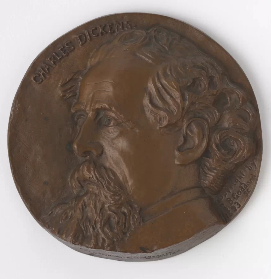 Ralph Bartlett Goddard,, Charles Dickens Plaquette, 1893,
Bronze, cast hollow by Henry Bonnard Bronze Co New York City, 7 5/16 x 7 5/16 in., Bates College Museum of Art, gift of John and Janet Marqusee, 1996.5.23